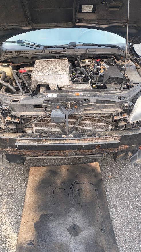 Project car with the front bumper removed during maintenance